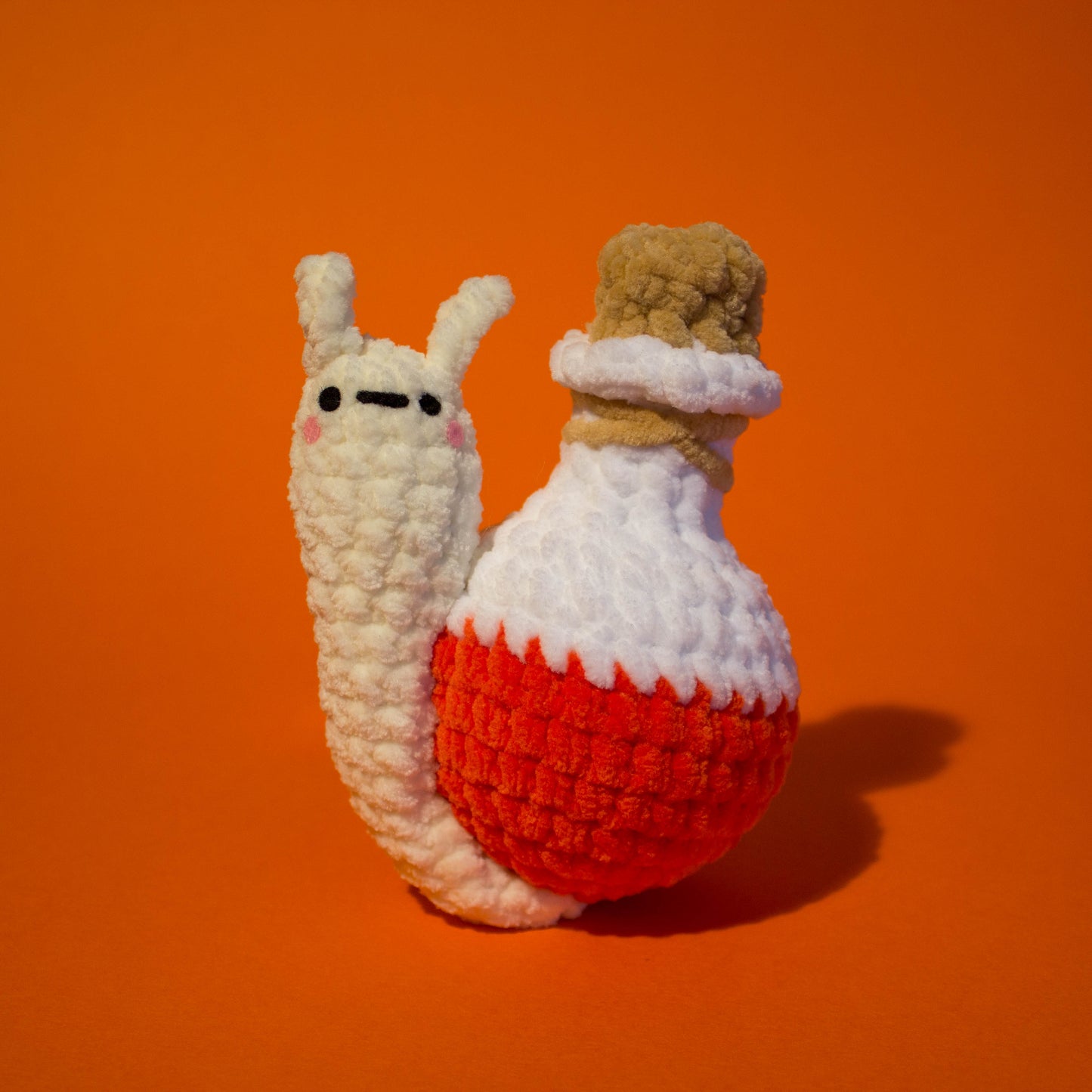 Poshawn The Potion Snail Crochet Plushie - Bright Orange